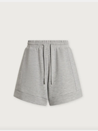 Light gray heathered sweatshirt shorts with an elastic waistband and drawstring, shown flat against a light gray background.