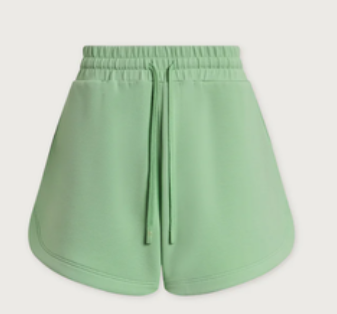 Light green athletic shorts with an elastic waistband and drawstring, shown against a light gray background.