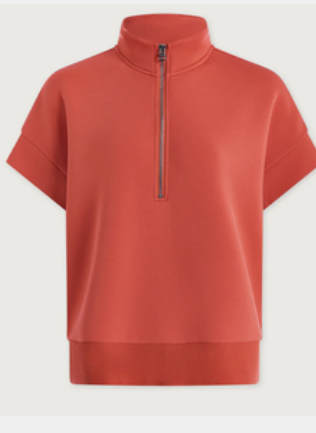 A coral orange short-sleeve quarter-zip sweatshirt with a ribbed hem and collar, shown against a light gray background.